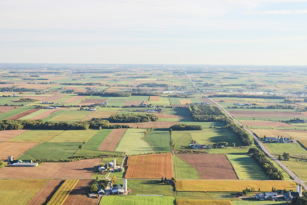 Open farmland and low horizon in rural Jutland